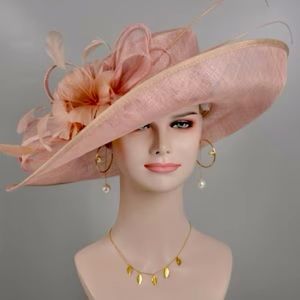Beautiful Kentucky Derby or summer hat in blush color.